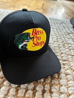 Bass Pro Shops Black Trucker Hat with Yellow Logo and Green Fish